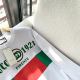 Back view of Gucci luxury clothing with monogram-inspired silhouette