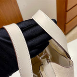 Side view of clean-lined structured handbag