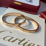 Angled view of Cartier unisex jewelry piece