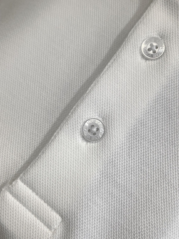 Side profile of Louis Vuitton luxury clothing with label-forward styling