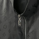 Close-up detail shot of Louis Vuitton luxury clothing with label-forward styling