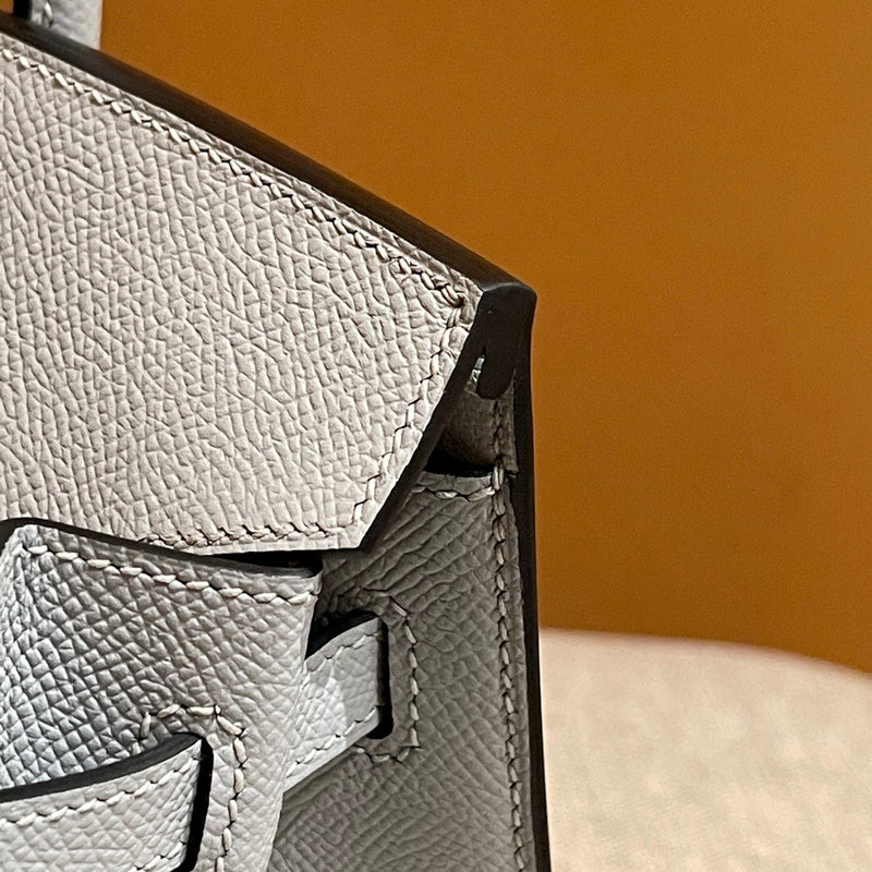 Side view of considered structured handbag