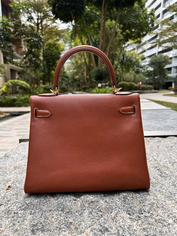Side view of structured structured handbag