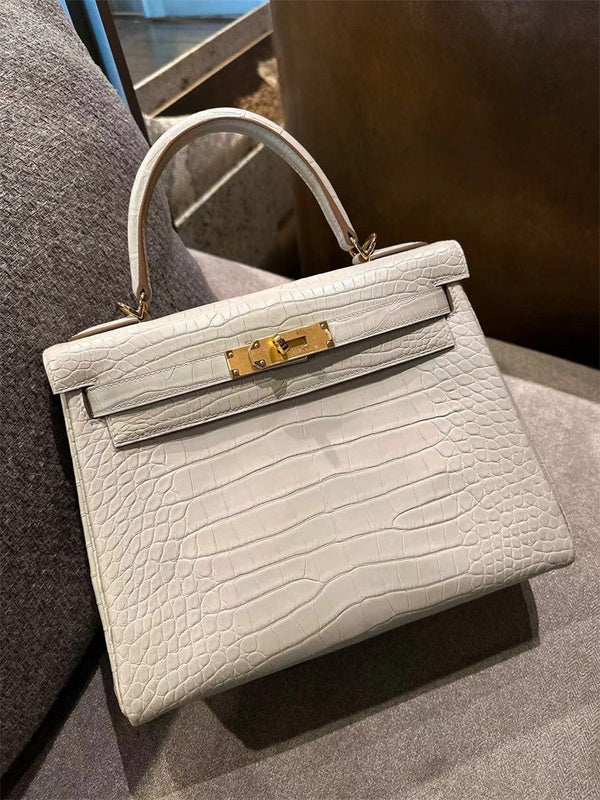 Side view of sleek structured handbag