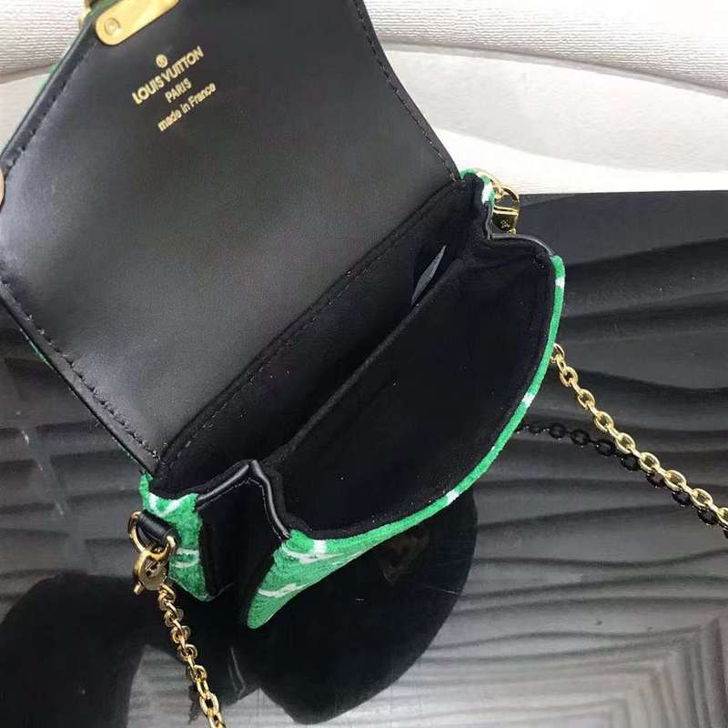 Side profile of statement polished women's handbag – women's premium purse