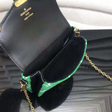 Side profile of statement polished women's handbag – women's premium purse