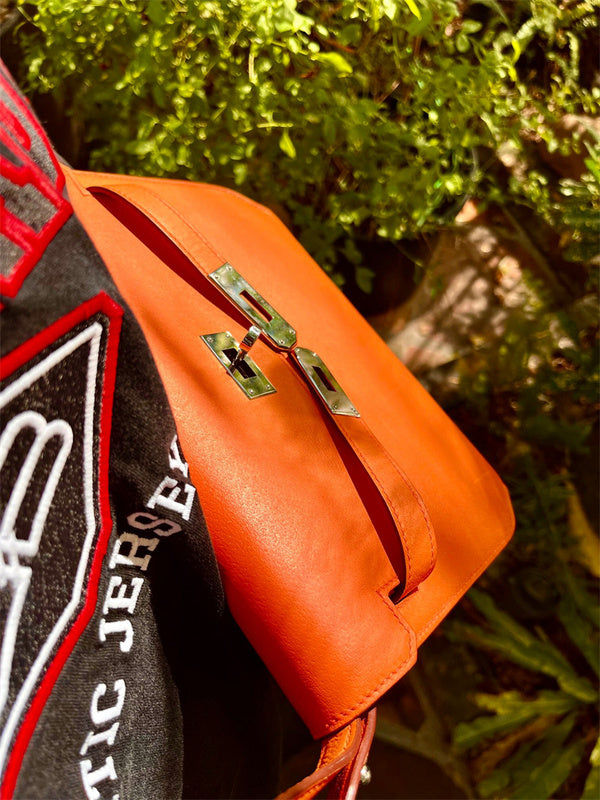  Graceful structured bag carried on shoulder