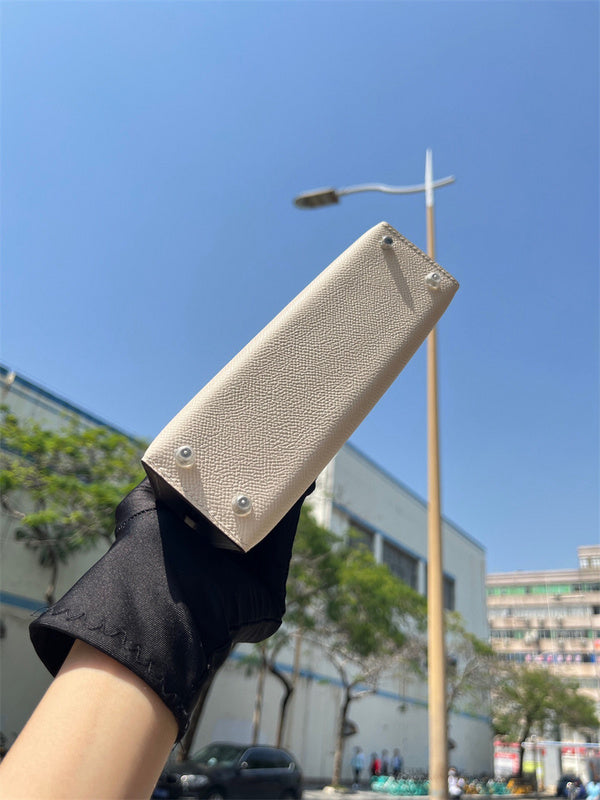 Side view of smart structured handbag