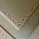 Side view of structured structured handbag