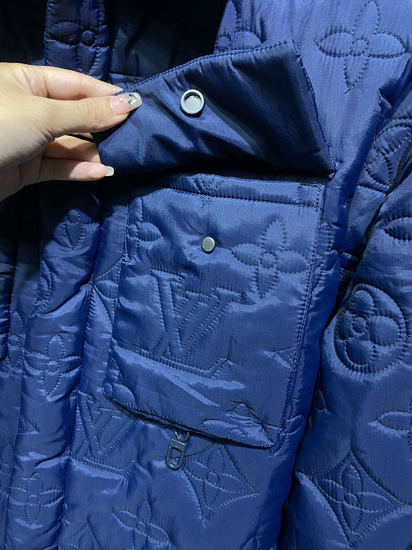 Front view of Louis Vuitton luxury clothing with label-forward styling