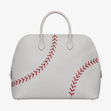 Side view of versatile structured handbag