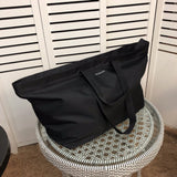 Top view of elevated sleek women's handbag – women's luxury handbag