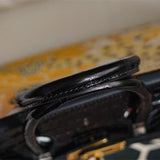  top-handle bag close-up of hardware and finish