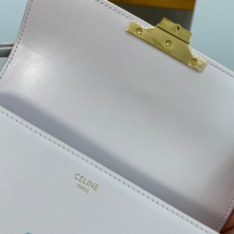 Handle and strap detail of classic signature women's handbag – women's designer-style accessory