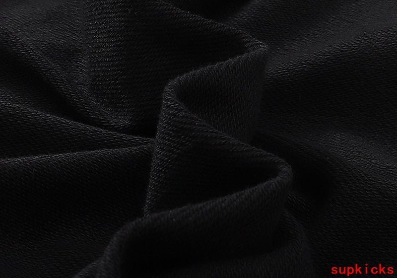 Front view of Rhude luxury clothing with signature branding