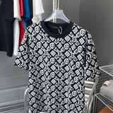 Flat lay presentation of Louis Vuitton cotton t-shirt with monogram-inspired silhouette