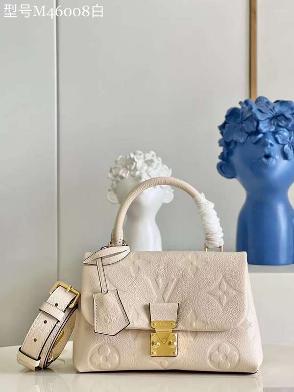 Side profile of everyday-luxe sleek women's handbag – women's luxury handbag