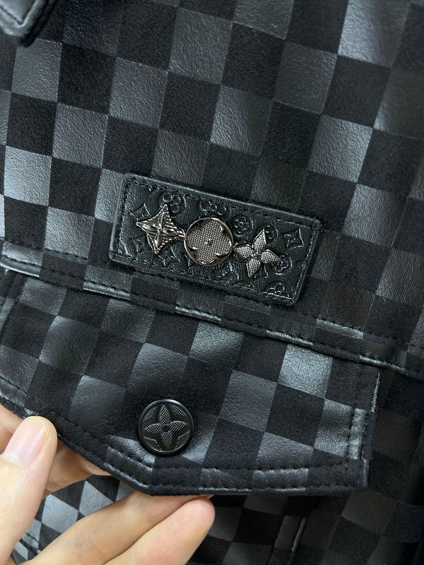 Flat lay presentation of Louis Vuitton luxury clothing with label-forward styling