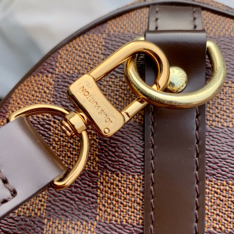 Styled lifestyle shot of polished signature women's handbag – women's luxury handbag