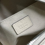 Close-up detail of polished signature women's handbag – women's luxury accessory