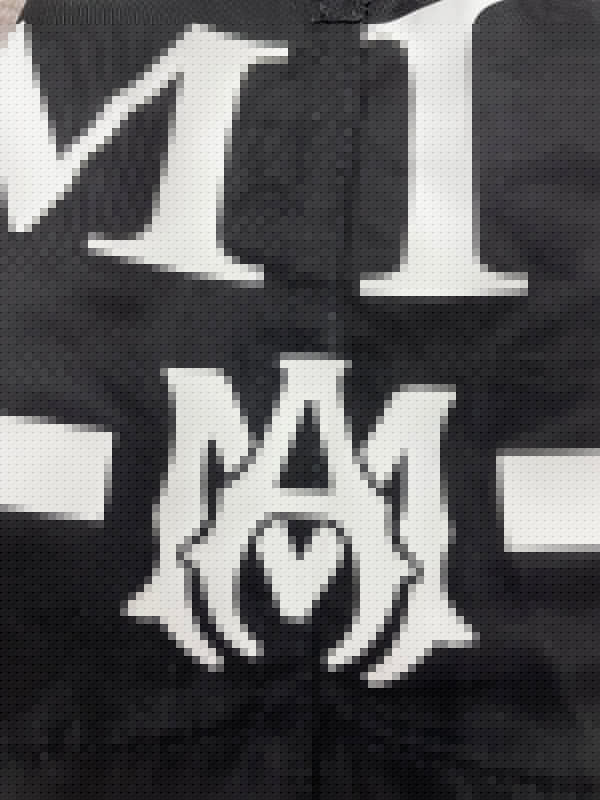 Three-quarter angle view of Amiri luxury piece style No.055