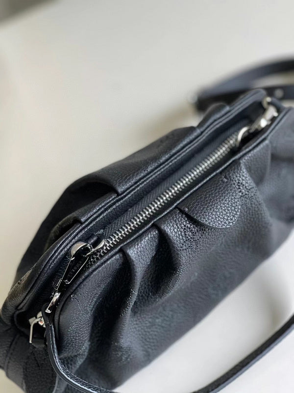 Close-up detail of structured everyday-luxe women's handbag – women's designer-style accessory