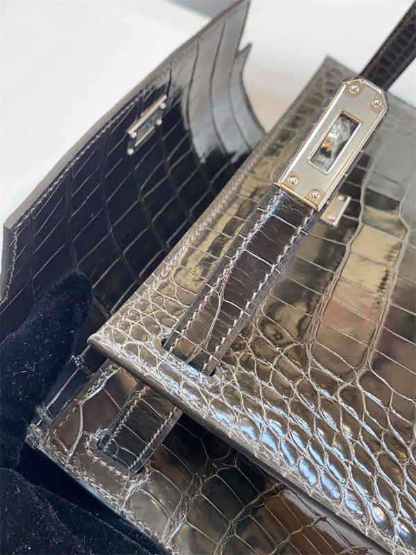  Polished carryall bag carried on shoulder 34