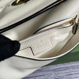 Side profile of signature modern women's handbag – women's statement bag