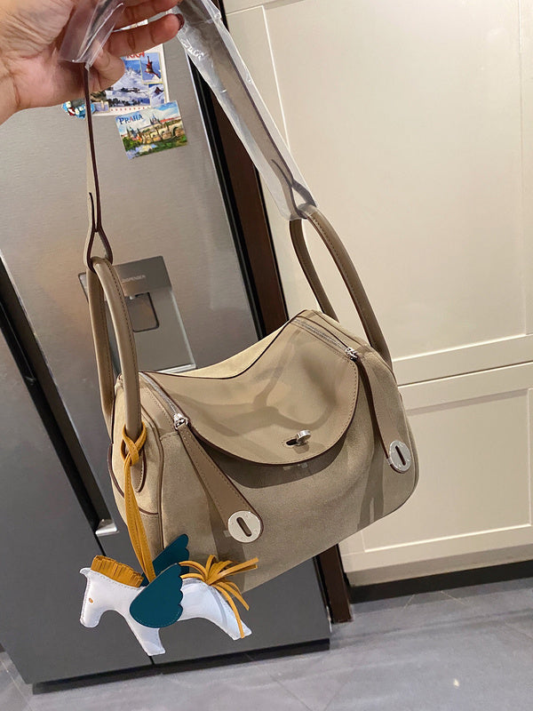 Side view of fluid structured handbag