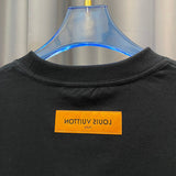 Close-up detail shot of Louis Vuitton cotton t-shirt with signature branding