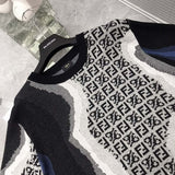 Flat lay presentation of Louis Vuitton luxury clothing with streetwear-inspired cut