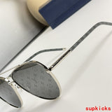 Close-up detail view of Louis Vuitton unisex sunglasses