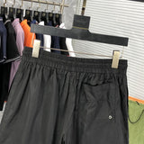 Front view of Rhude luxury clothing with label-forward styling