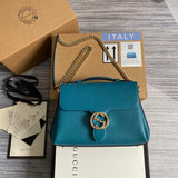 Front view of signature polished women's handbag – women's everyday handbag