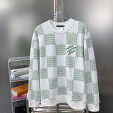 Front view of Louis Vuitton luxury clothing with label-forward styling