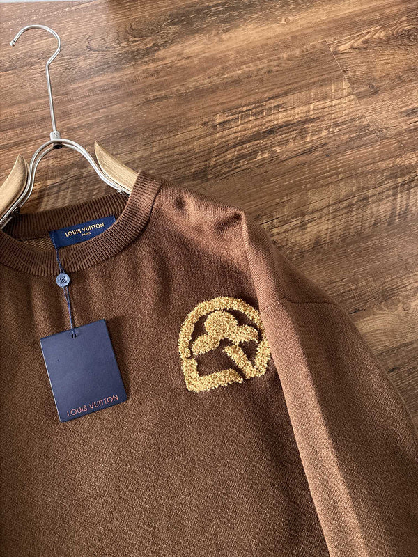 Full styled look of Louis Vuitton luxury clothing with logo-detail design