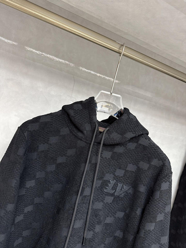 Close-up detail shot of Louis Vuitton luxury clothing with everyday silhouette