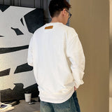 Full styled look of Louis Vuitton luxury clothing with relaxed-fit cut
