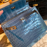 Side view of classic structured handbag