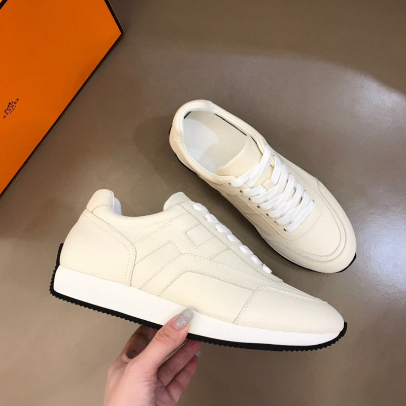 Hermès Red Slip-On Sneakers - Angled View