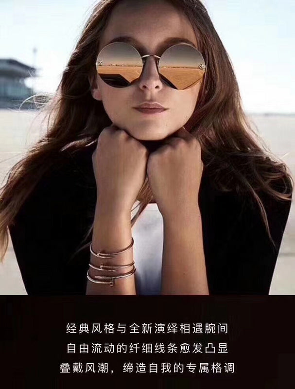 Side view of Cartier unisex jewelry piece