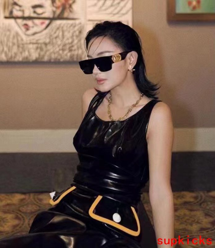 Close-up detail view of Louis Vuitton unisex sunglasses