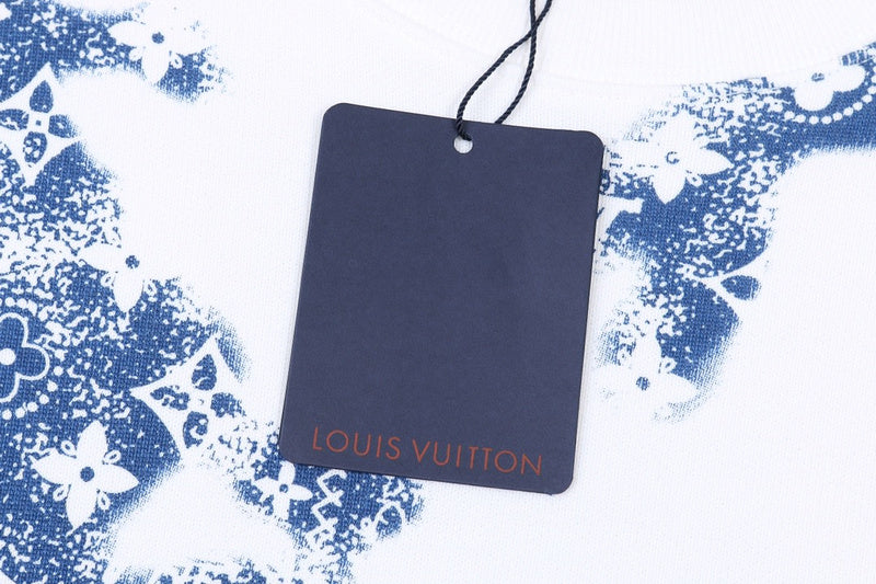 Flat lay presentation of Louis Vuitton luxury clothing with streetwear-inspired cut