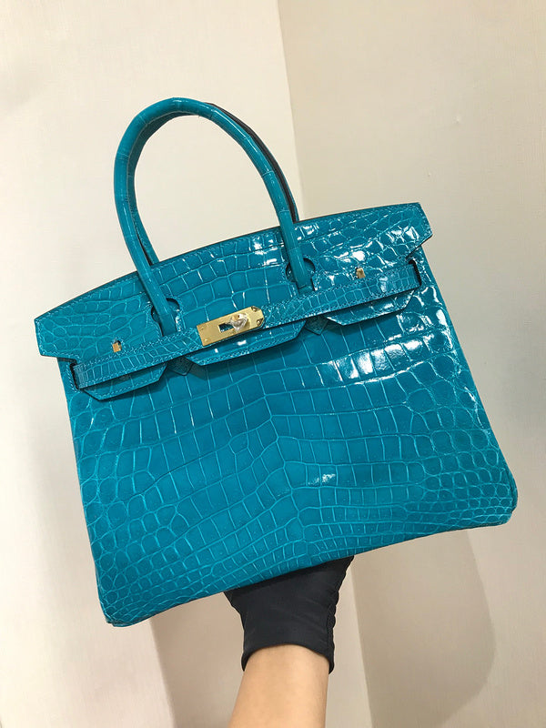 Side view of understated structured handbag