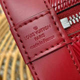 Side profile of polished classic women's handbag – women's statement bag