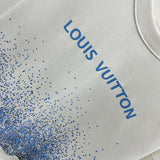 Flat lay presentation of Louis Vuitton luxury clothing with tailored silhouette