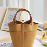  Structured satchel carried on shoulder