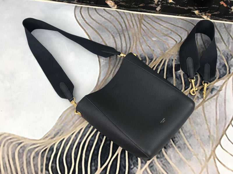 Handle and strap detail of modern structured women's handbag – women's luxury handbag