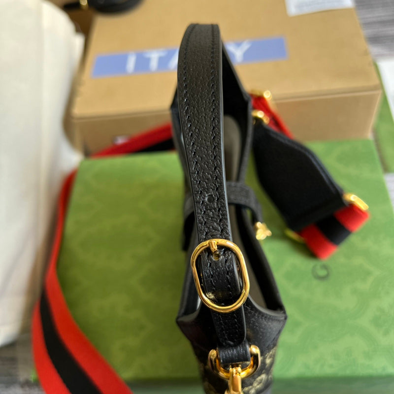 Close-up detail of structured signature women's handbag – women's luxury accessory