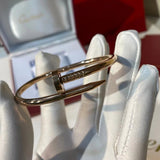 Close-up detail view of Cartier unisex jewelry piece